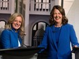 Alberta NDP Leader Rachel Notley, left, and UCP Leader Danielle Smith shake hands as they pose for a photo prior to their debate at CTV Edmonton on Thursday, May 18, 2023.
